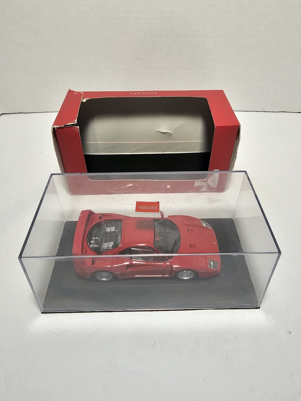 Ferrari Red Collectible Model Car in Display Case